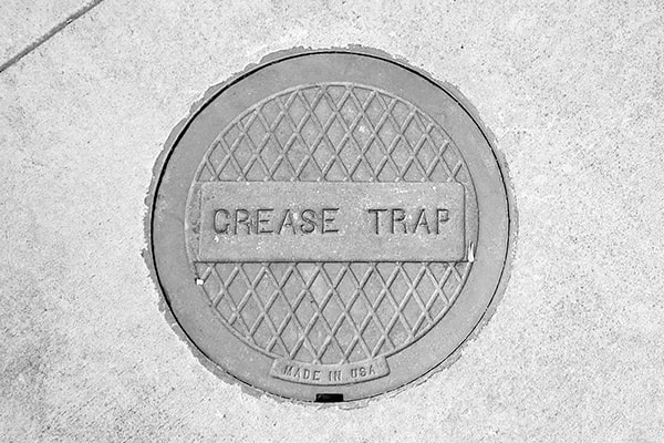 to maintain the effectiveness of grease trap pumping, regularly skim off grease and scrape off solid buildup from the trap surfaces